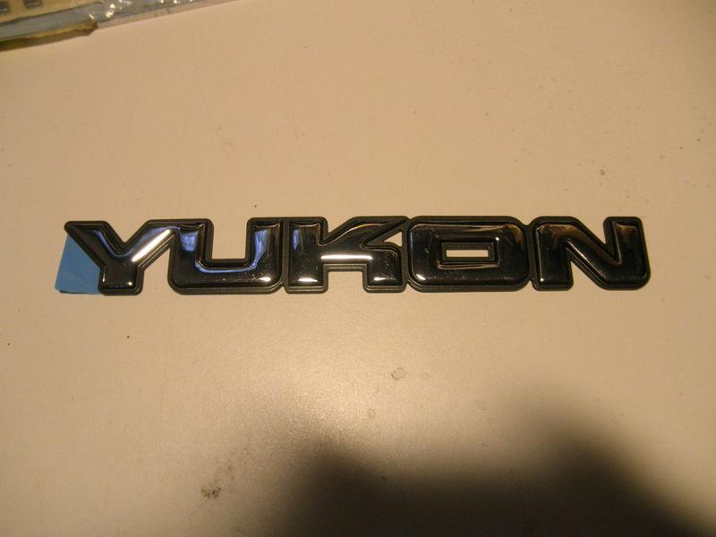 Nos gmc  "yukon" emblem / script for 2001 -2006 trucks