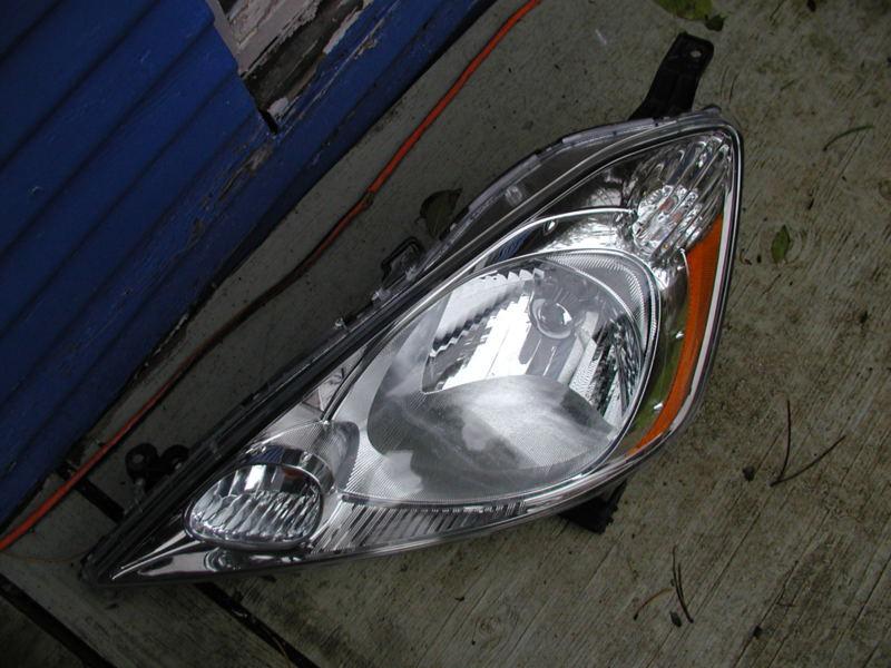 Honda fit 2009-2013 left headlight assembly base, dx, clear background oem