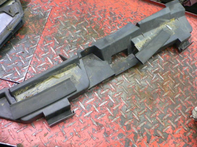 84 pontiac fiero plastic trim part from under hood, wiper motor cover