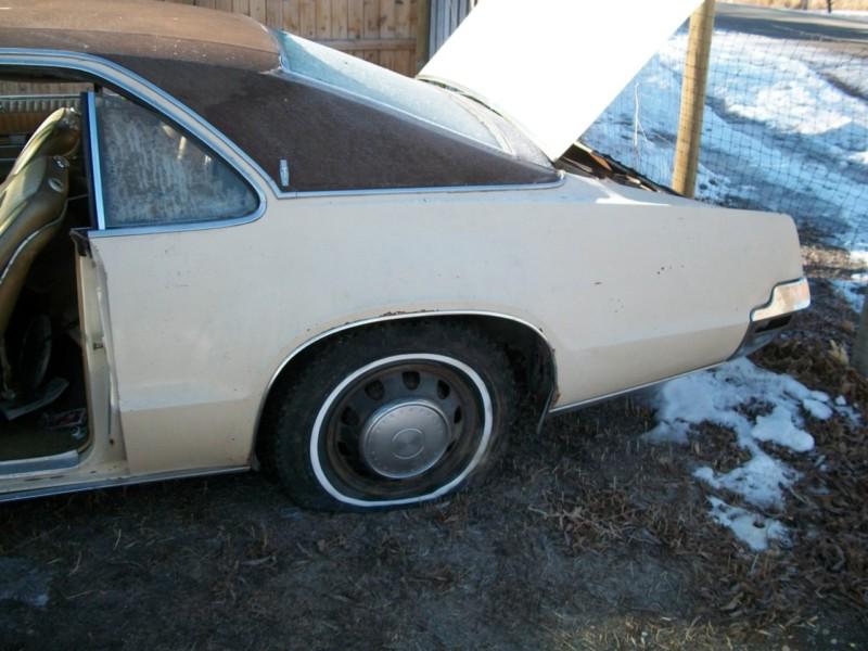 Rear belt moulding bright trims at base of 1/4 glass 1966-70 toronado  67ot1-xab