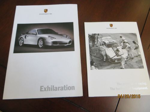 2000 porsche 911 two (2) factory booklets/brochures