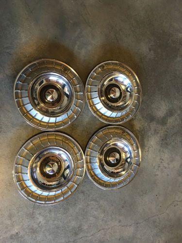 Original hub caps from a 1962 ford thunderbird