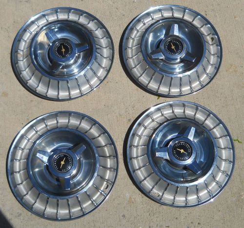 Vintage/original complete set of ford 1963 thunderbird/t-bird hubcaps clean