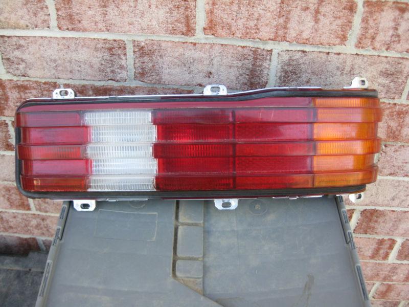 77-85 mercedes-benz w123 240d 300d 280e 230e passenger side tail light  oem