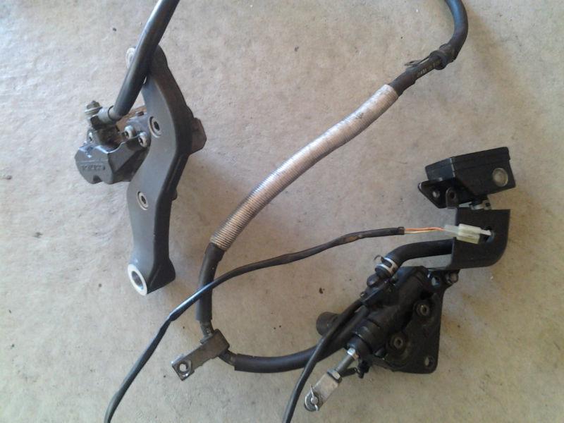 Rear brake caliper and master cylinder assembly