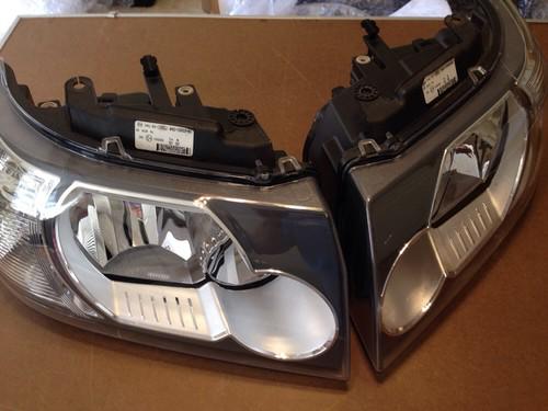 Land rover lr2  freelander 2 headlight head lamp set pair genuine halogen nto