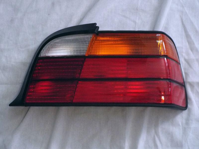 Tyc 11-5997-01 tail light assembly bmw 92-99 323is,325is,328is