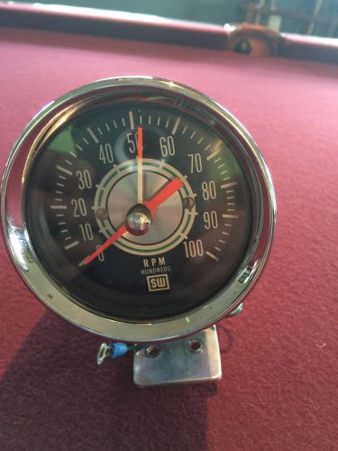 Vintage stewart warner green line tach