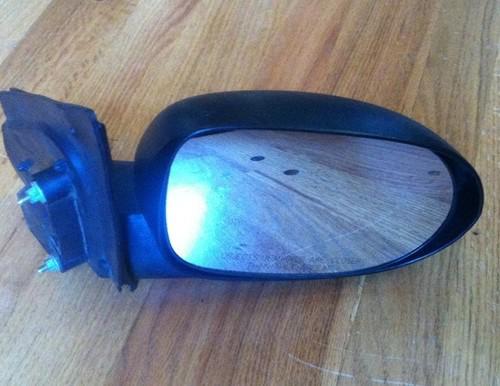 New manual rh passengers side door mirror for a dodge caliber