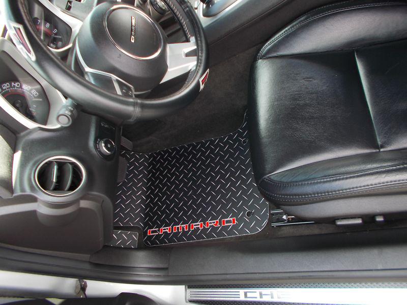 Camaro emblem floor mats.   black with exposed metal diamonds  front rear  set