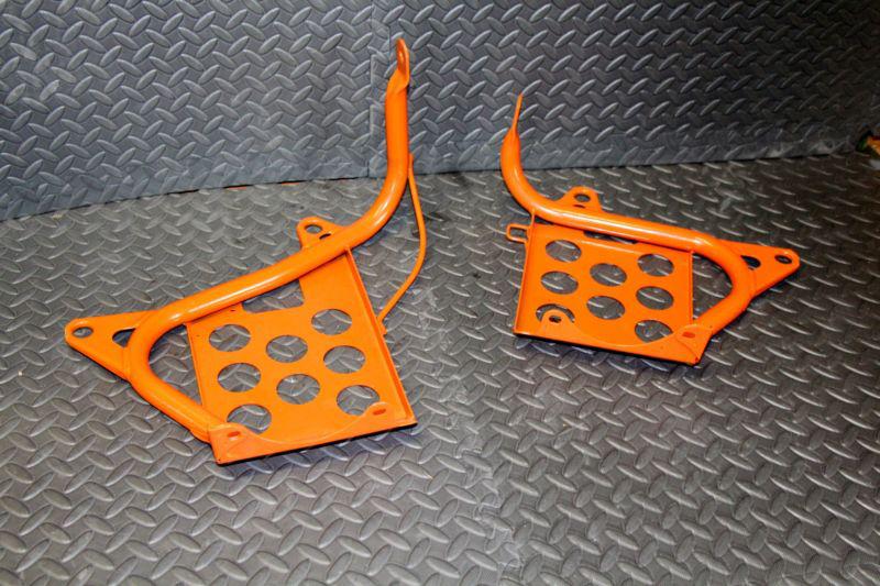 Banshee factory nerfs oem nerf bars heel guards left right orange