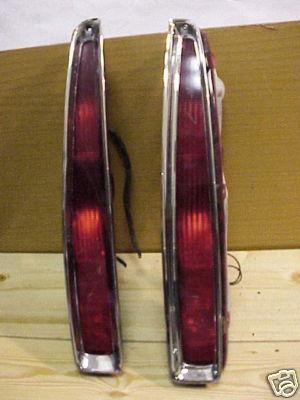 Cadillac deville cadillac concours 94-99 1994-99 tail light w/ bezel set rh & lh