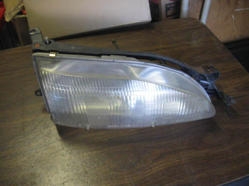 Toyota camry head light right passenger rh  92-96 factory original part