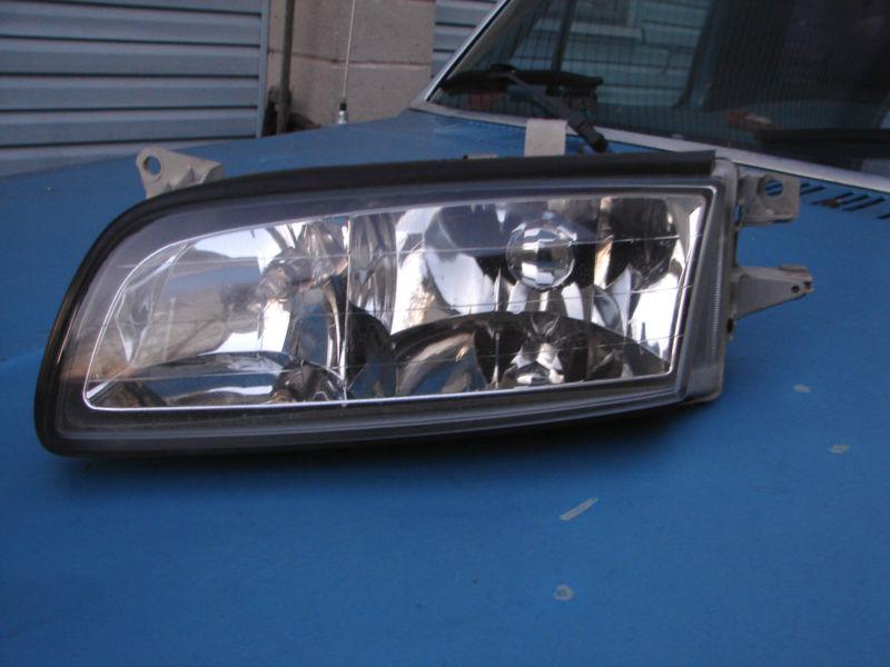 1997 98 99 00 millenia headlight complete lh