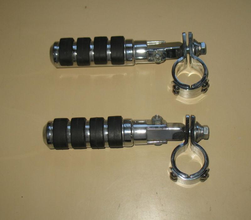 Universal kuryakyn iso highway pegs with 1.25" clamps