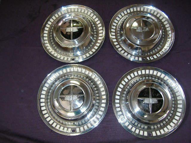 1956 dodge custom royal lancer hubcaps, (4) 14"