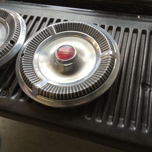 1957 buick hub caps decent shape