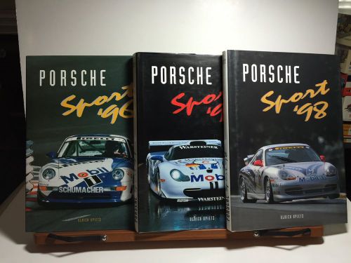 Porsche sport 1996, 1997 and 1998 hardbound books with dust jacket ulrich upietz