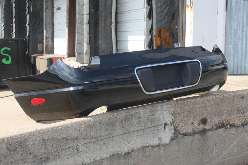 02 03 04 05 ford thunderbird t-bird black rear bumper plastic cover