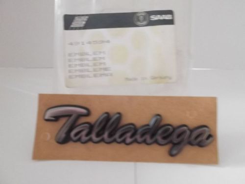 Saab 900 1994 talladega emblem new in oe bag