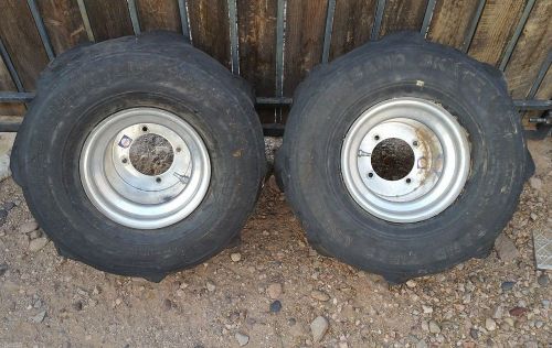 Sand skate paddle tires 21 x 12 x 8  on aluminum rims 4 x 110