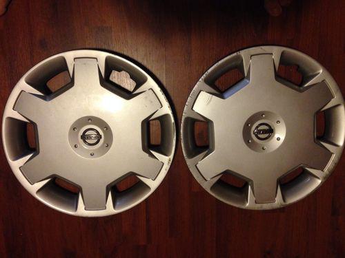 2 factory origional nissan versa hubcaps.