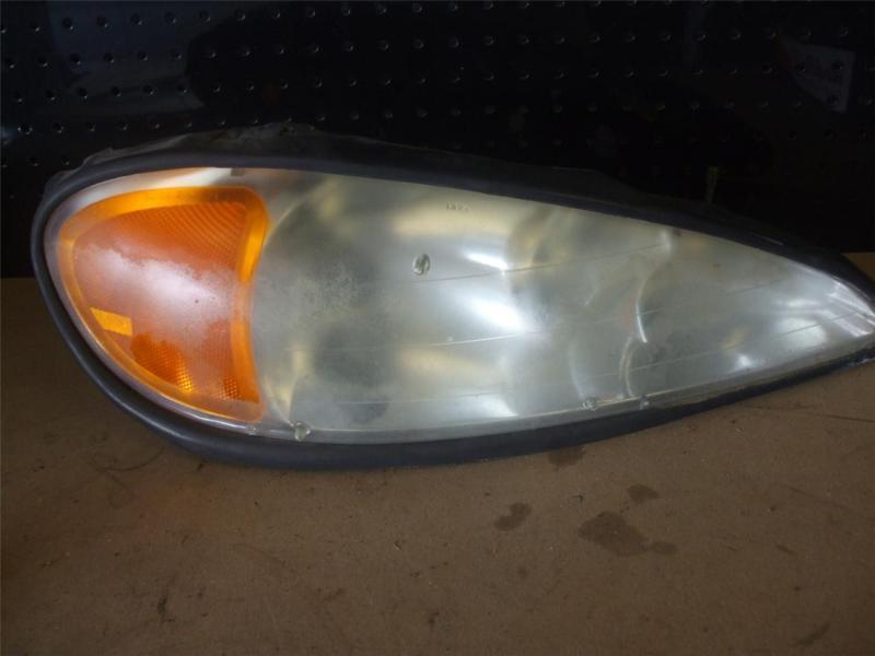 '99-2005 pontiac grand am rh / passenger side headlight lamp oem gm 16524552