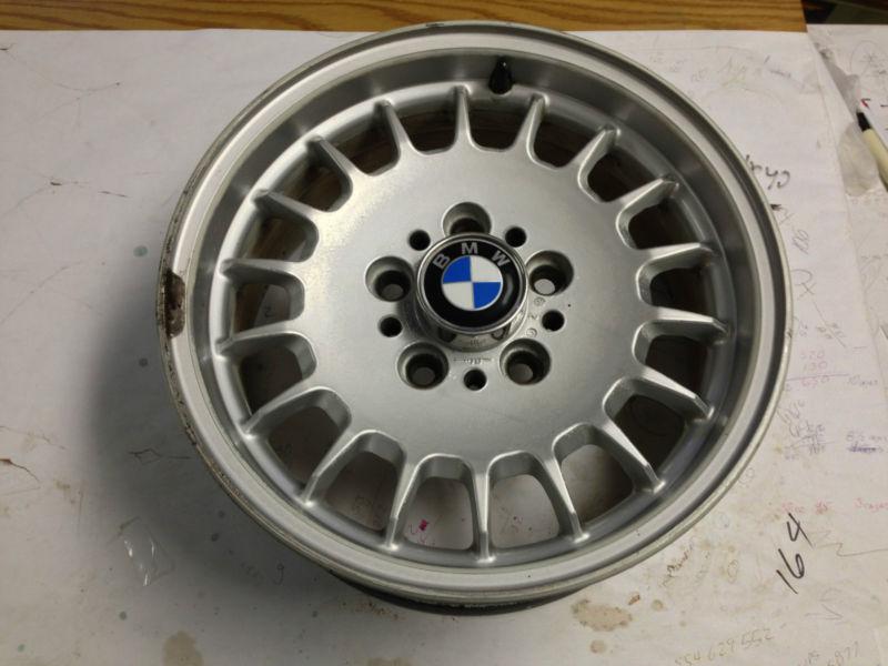 4 original used bmw 533i wheels and center caps only