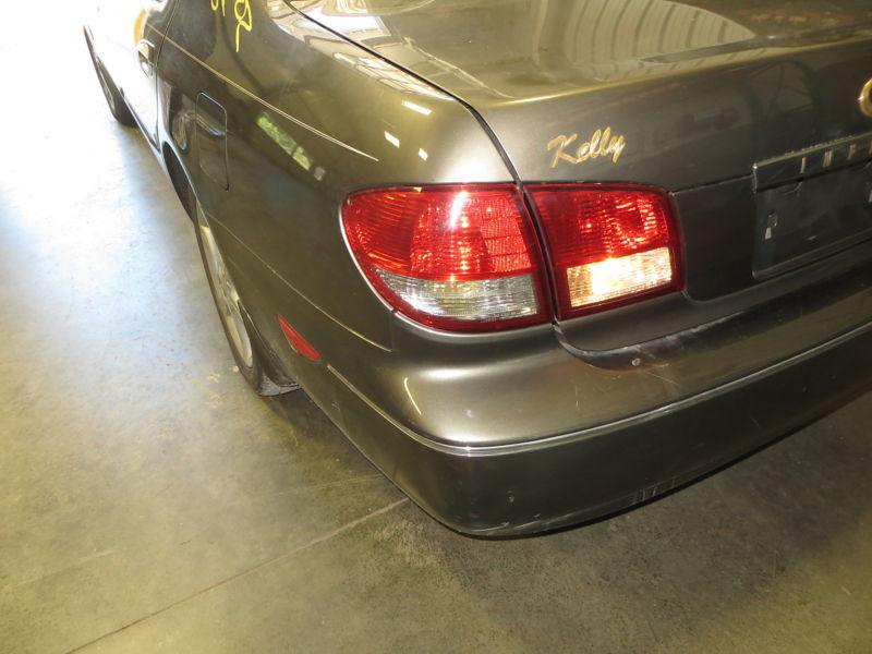 Driver side (left) tail light for a 2002 infiniti i35