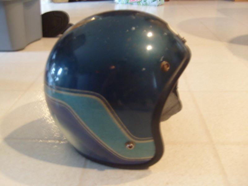 Vintage blue metal flake snowmobile helmet.