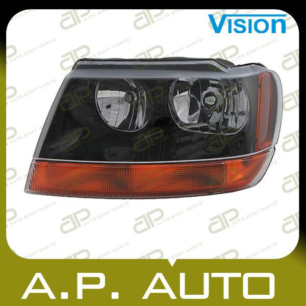 Head light lamp assembly 99-02 jeep grand cherokee laredo left l/h black+amber