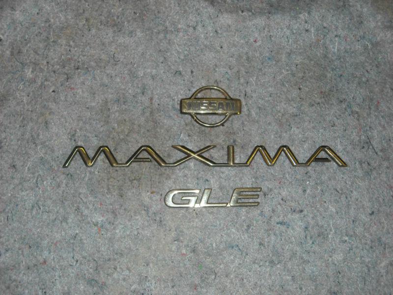 Nissan maxima gle gold luxury three emblems