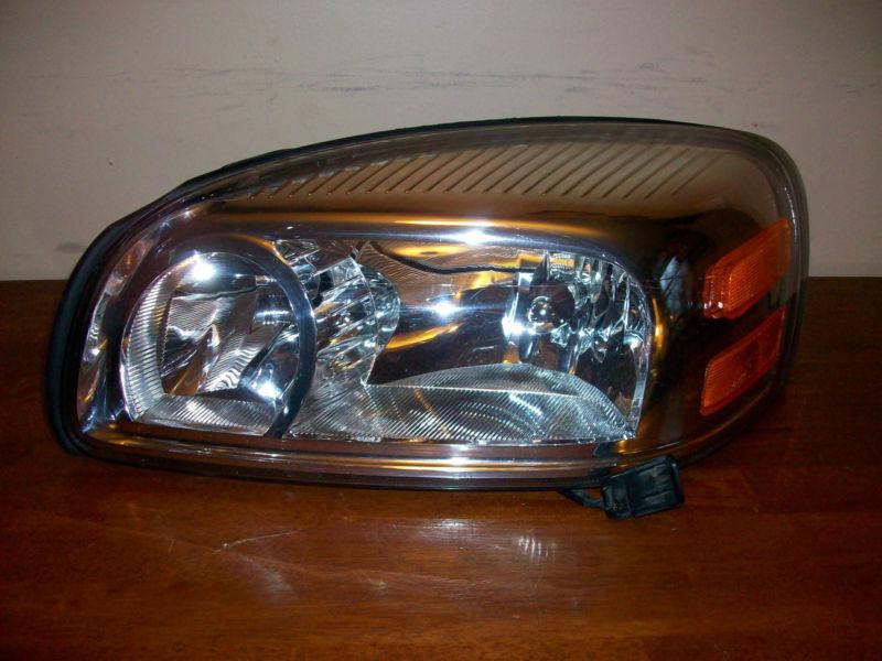 Chevy/ pontiac/ saturn/ buick left hand side headlight 2005-2008 05 06 07 08 oem
