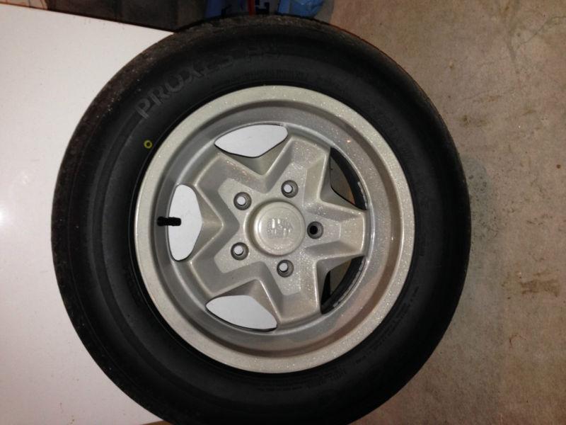 Porsche 911/912/944 cookie cutter rims and tires with center caps