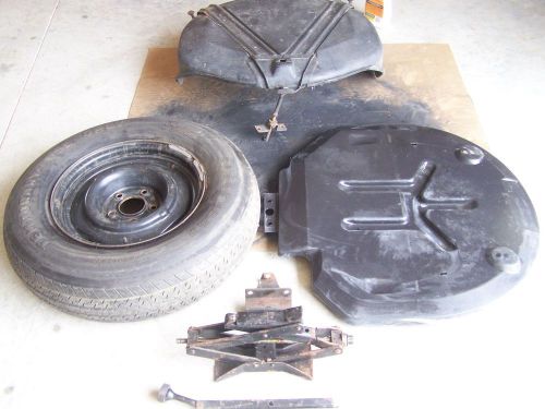 1978 corvette tire carrier with hardware, spare tire and jack with handle