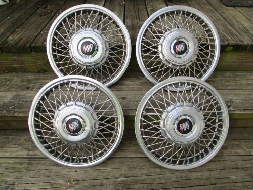 1986 -1990 buick century wire hubcaps set of 4 w/1 extra center