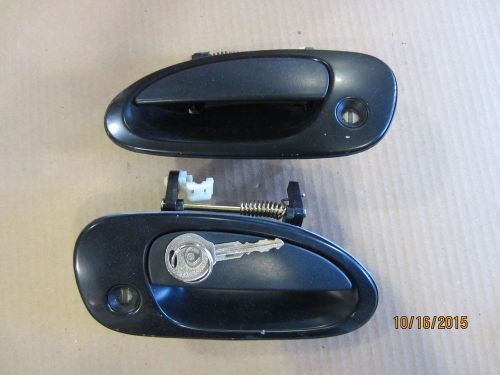 2 front handle, outside black, right and left mazda protege 1996-1997-1998