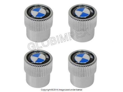 Bmw (1967-2008) wheel valve stem cap set with &#034;roundel&#034; logo (4) genuine