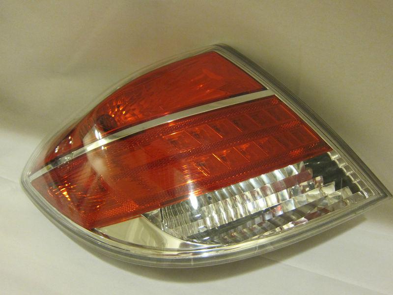 2007-2010 saturn aura used oem tail light on the left (driver) side