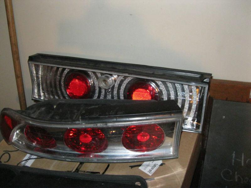 Mitsubishi eclipse clear right left and center tail lights  set 1995 96,97,98,99