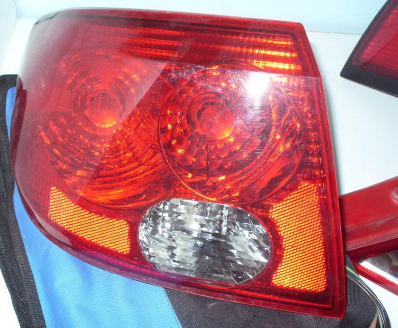 03 - 06 saturn l200 sedan lh left hand driver side tail light 