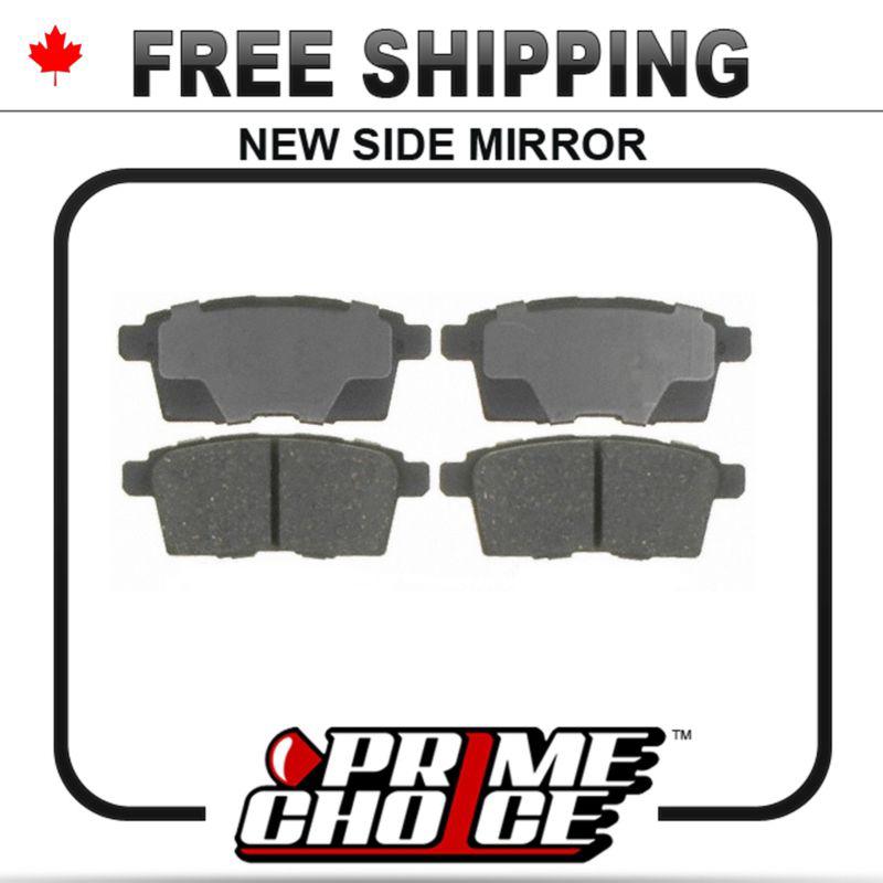 New premium complete set of rear metallic disc brake pads with shims