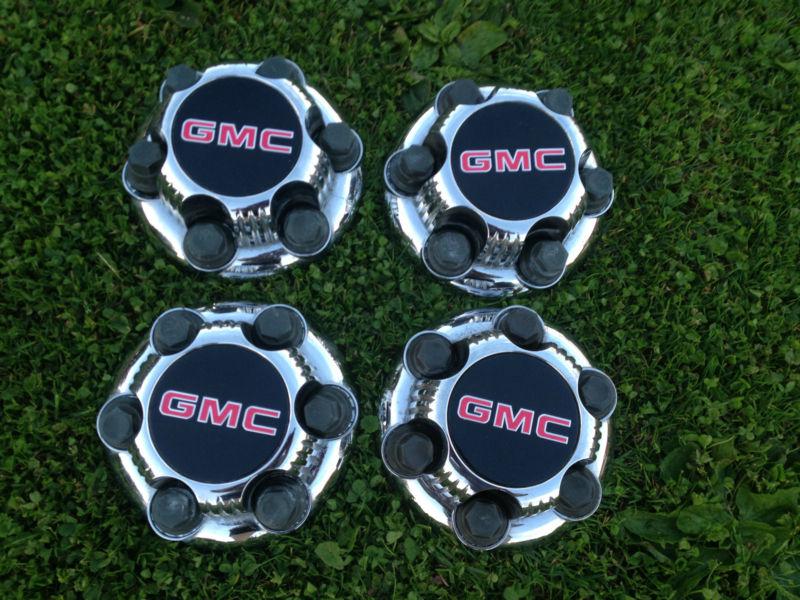 Used-set 4 gmc 1999-2014 6 lug chrome plated plastic oem center caps truck 