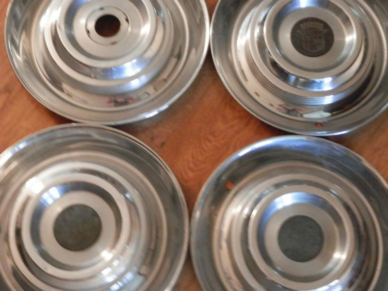 1954-55 cadillac hubcaps set of 4