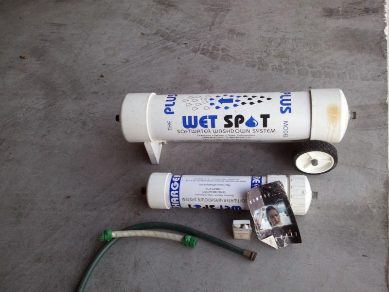 Wet spot water softener washdown system boat plane car