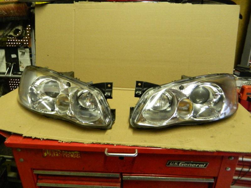 Mazda millenia headlight assembly set pair 01 02 passenger and drivers side