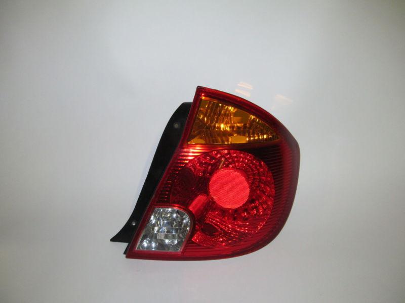 03 04 05 hyundai accent hatchback oem right tail light nice! 