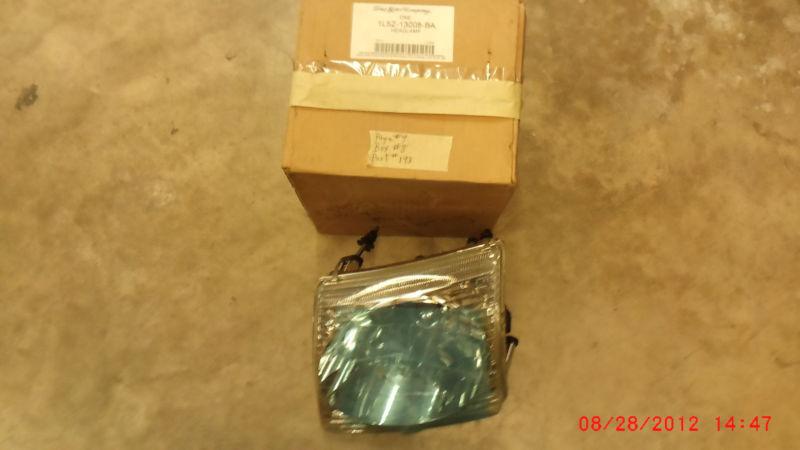 (#186) 01-05- ford explorer sport trac l.h.head lamp new oem