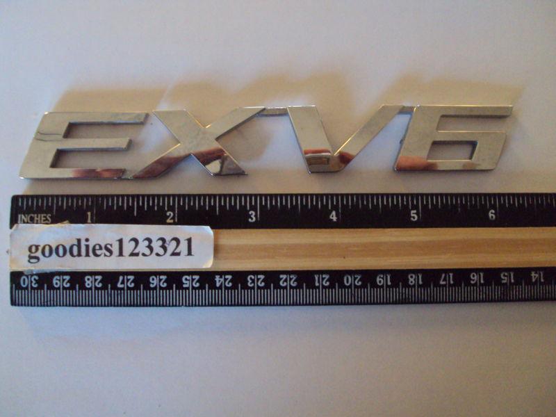 Exv6 chrome emblem used 6 1/4" x 1"