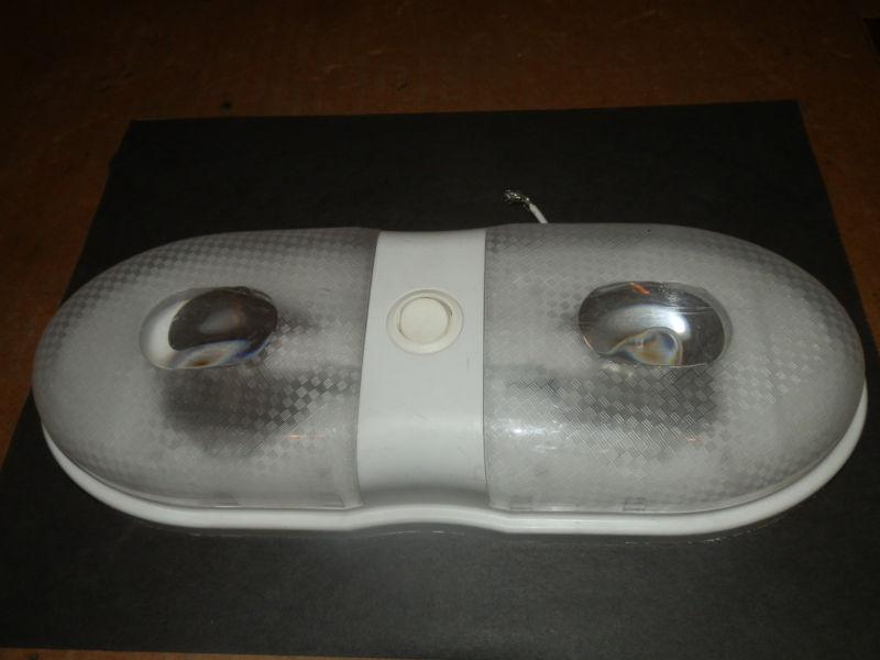 12 volt oval light white with clear covers 11" x 4 3/8" x 2" 